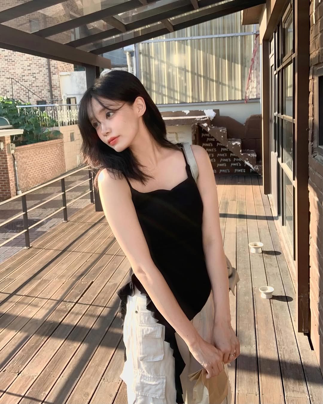 Photo by 차진아 on July 22, 2025. May be an image of 1 person, hair, slip, sleepwear, dress, sundress and text.