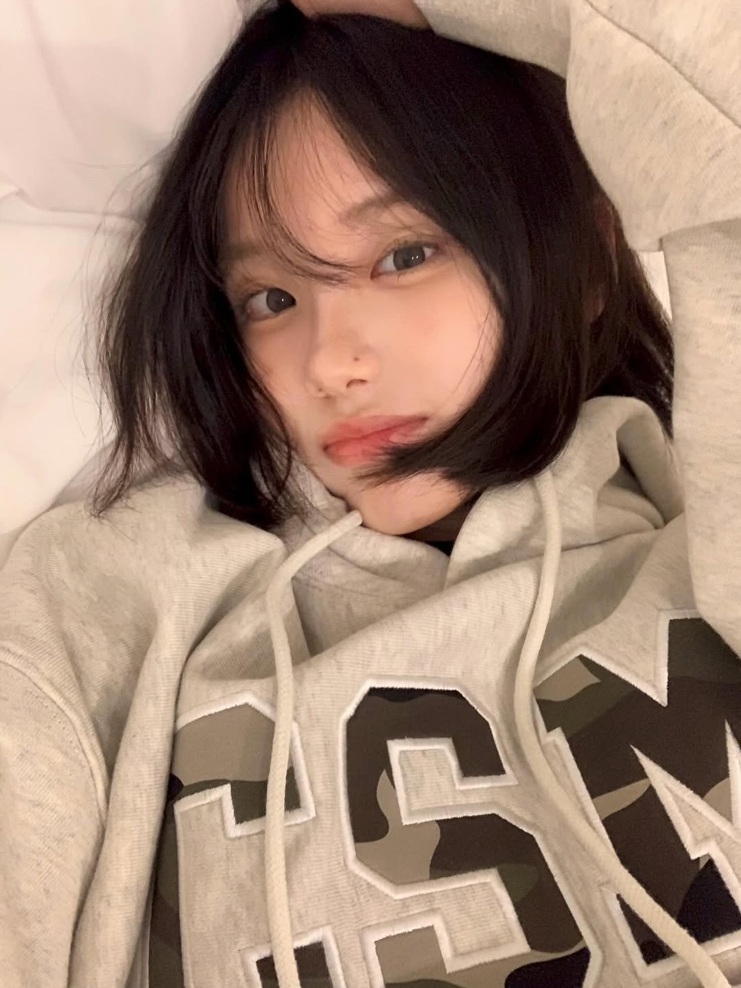 Photo by 차진아 on September 27, 2025. May be a selfie of 1 person, hair, parka, sweatshirt and text.