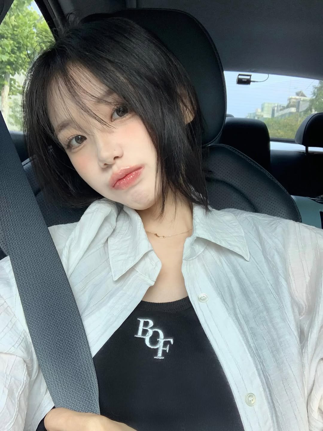 Photo by 차진아 on August 03, 2025. May be a selfie of 1 person, hair, top, seatbelt and text.