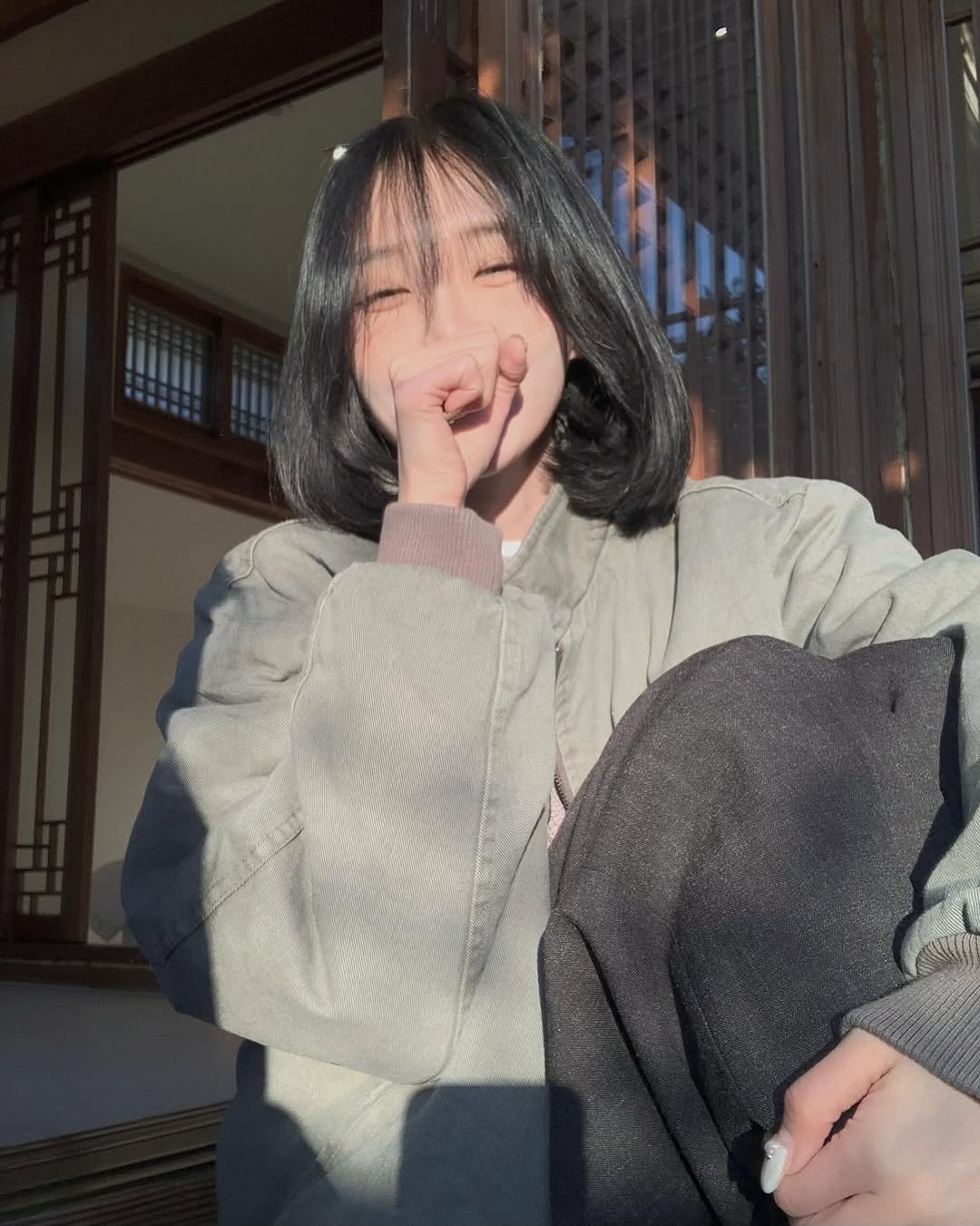 Photo by 차진아 on December 02, 2025. May be an image of one or more people, hair, turtleneck, parka and text.