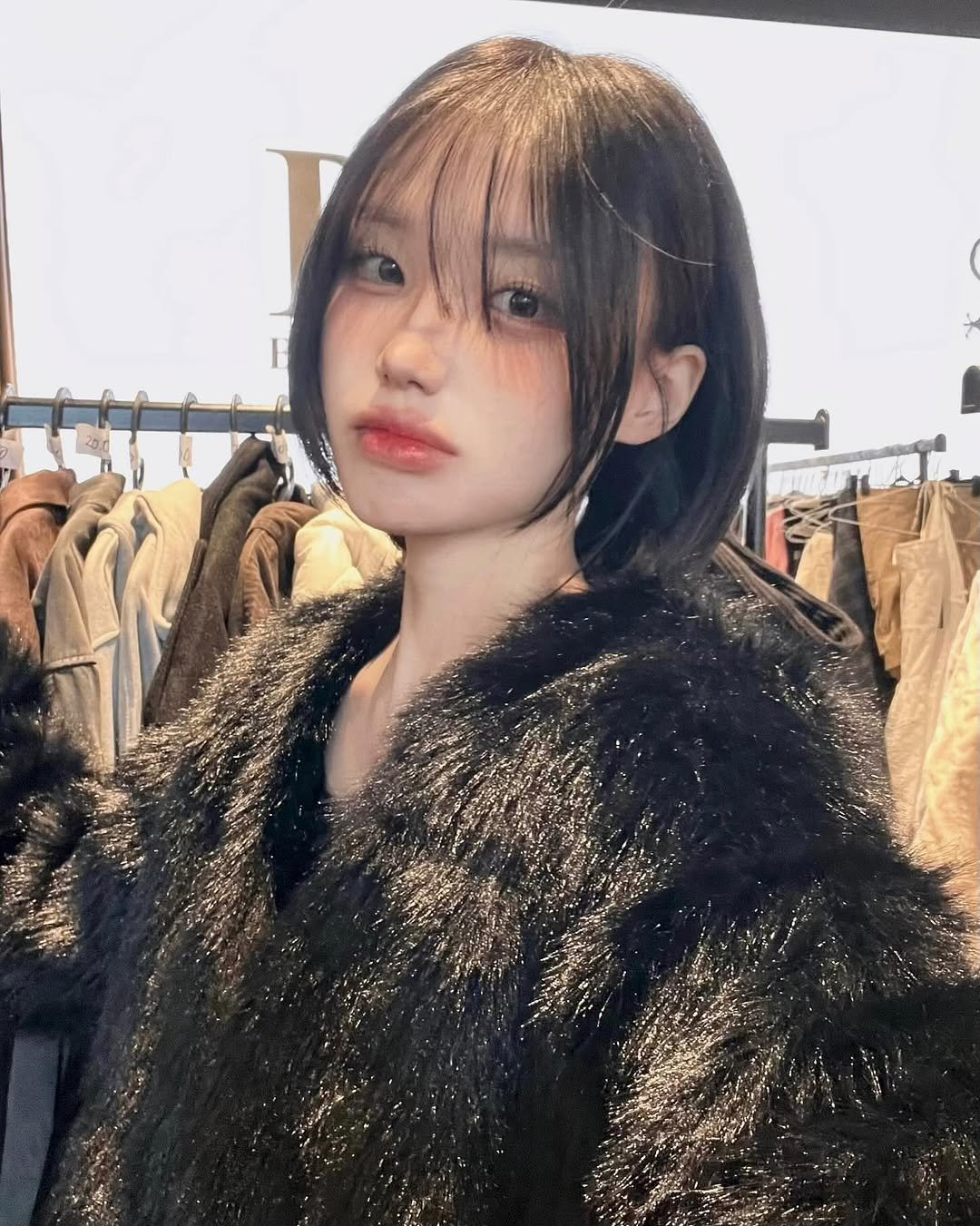 Photo shared by 차진아 on December 21, 2025 tagging @sheinofficial, @sheinkorea_, and @shein_sports. May be an image of one or more people, hair, sable coat, goosedown coat, duffle coat, top, parka and text.