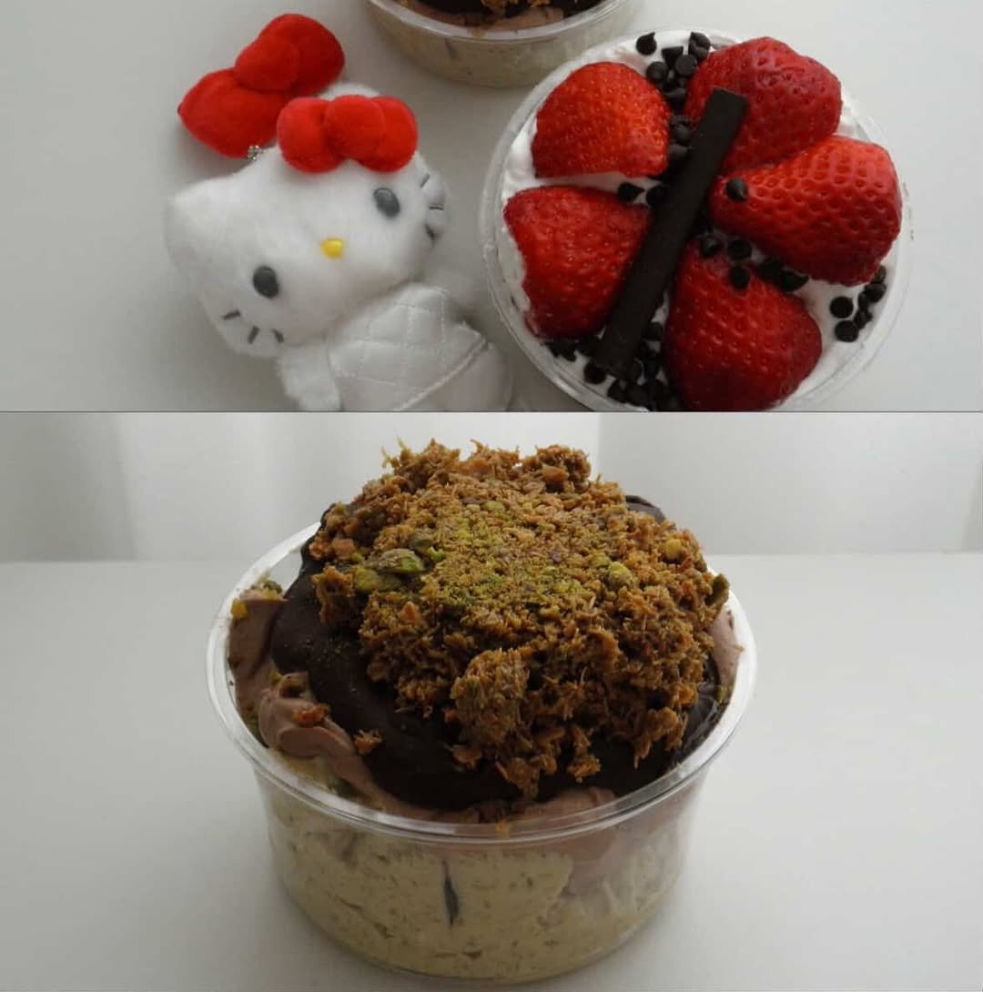 Photo by 위로상점: 수제 스콘 전문점 연말케이크 on February 15, 2026. May be an image of gelato, cereal, cheesecake, strawberry, granola, chocolate mousse and text.