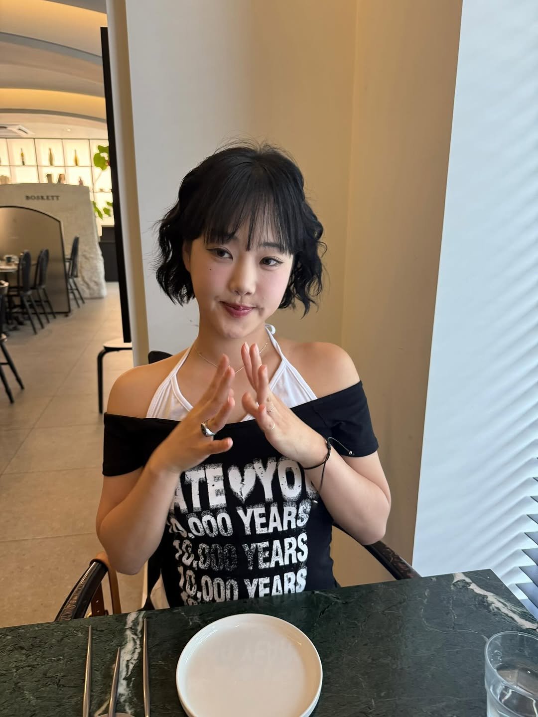 Photo by 지하니🍒💛 on August 05, 2025. May be an image of 1 person, sundress and text.