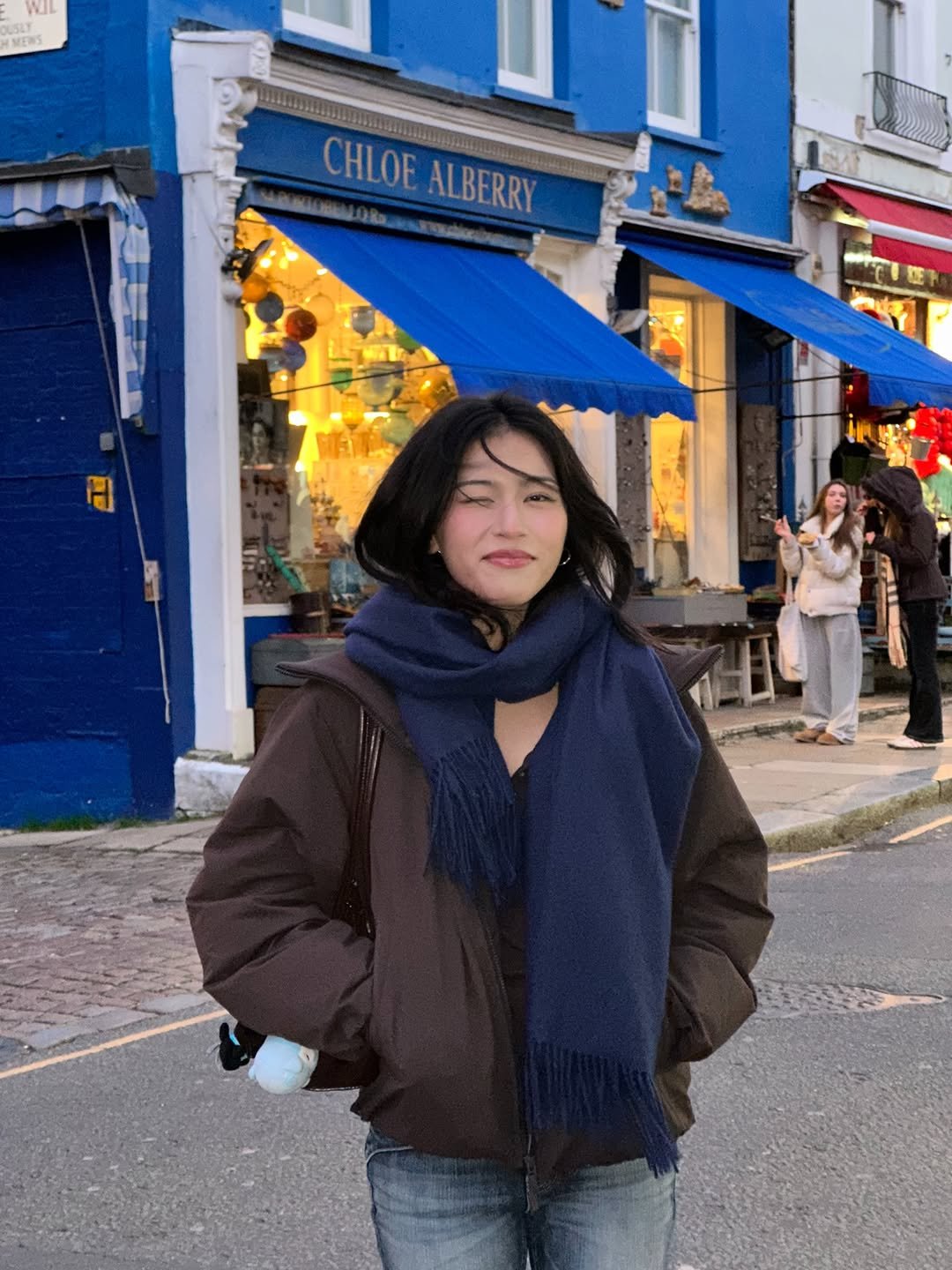 Photo by 최수연 🪼 on February 01, 2026. May be an image of duffle coat, scarf, parka, sling and text.