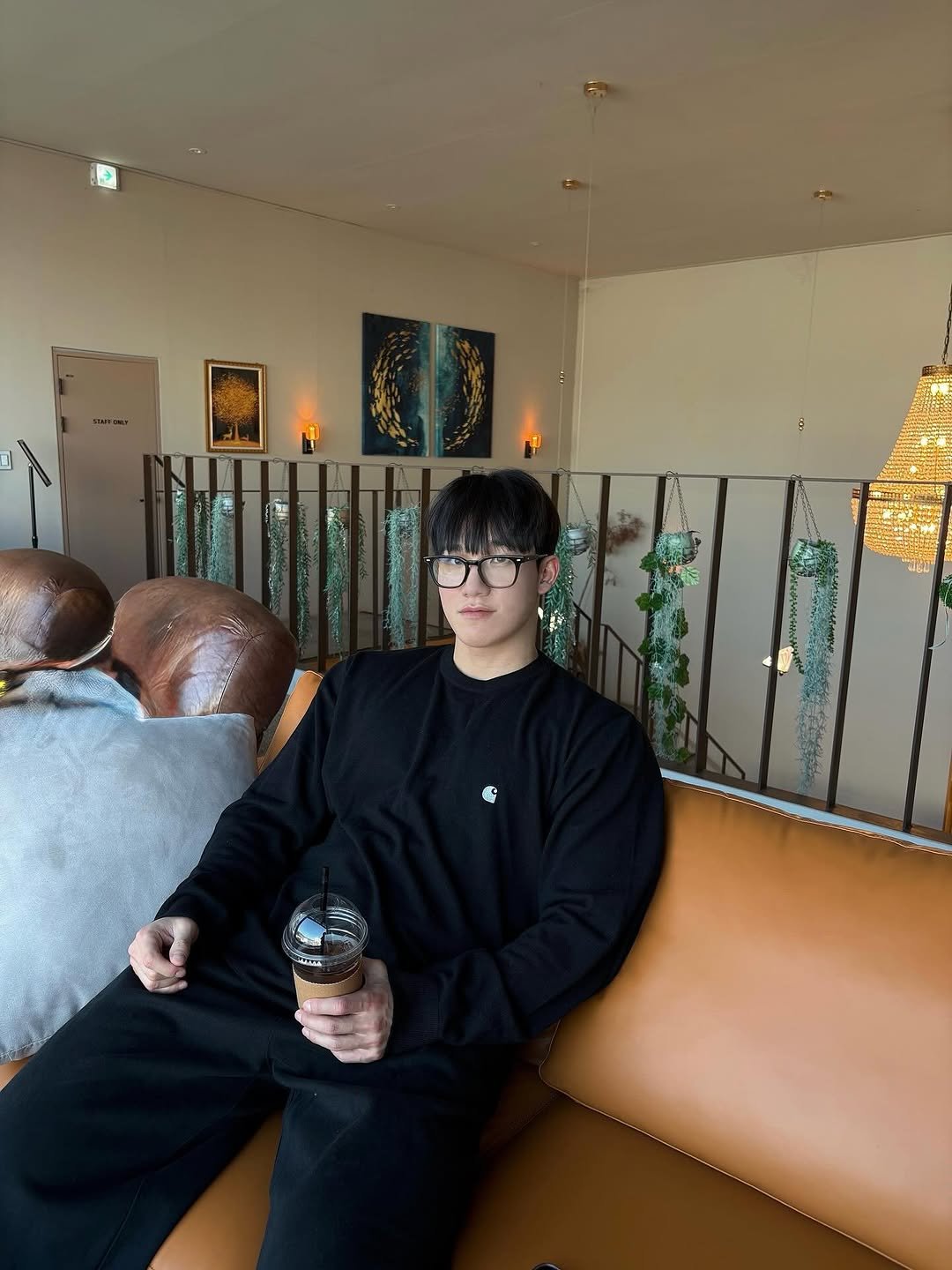 Photo by 최마루 on January 26, 2026. May be an image of armchair, sofa, sweatpants and text.