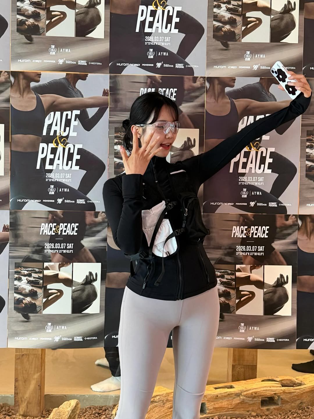 Photo shared by 차소연 | Soyeon Cha on March 14, 2026 tagging @aywa_official, and @1000calclub. May be an image of one or more people, people standing, activewear, turtleneck, sportswear, tights and text.