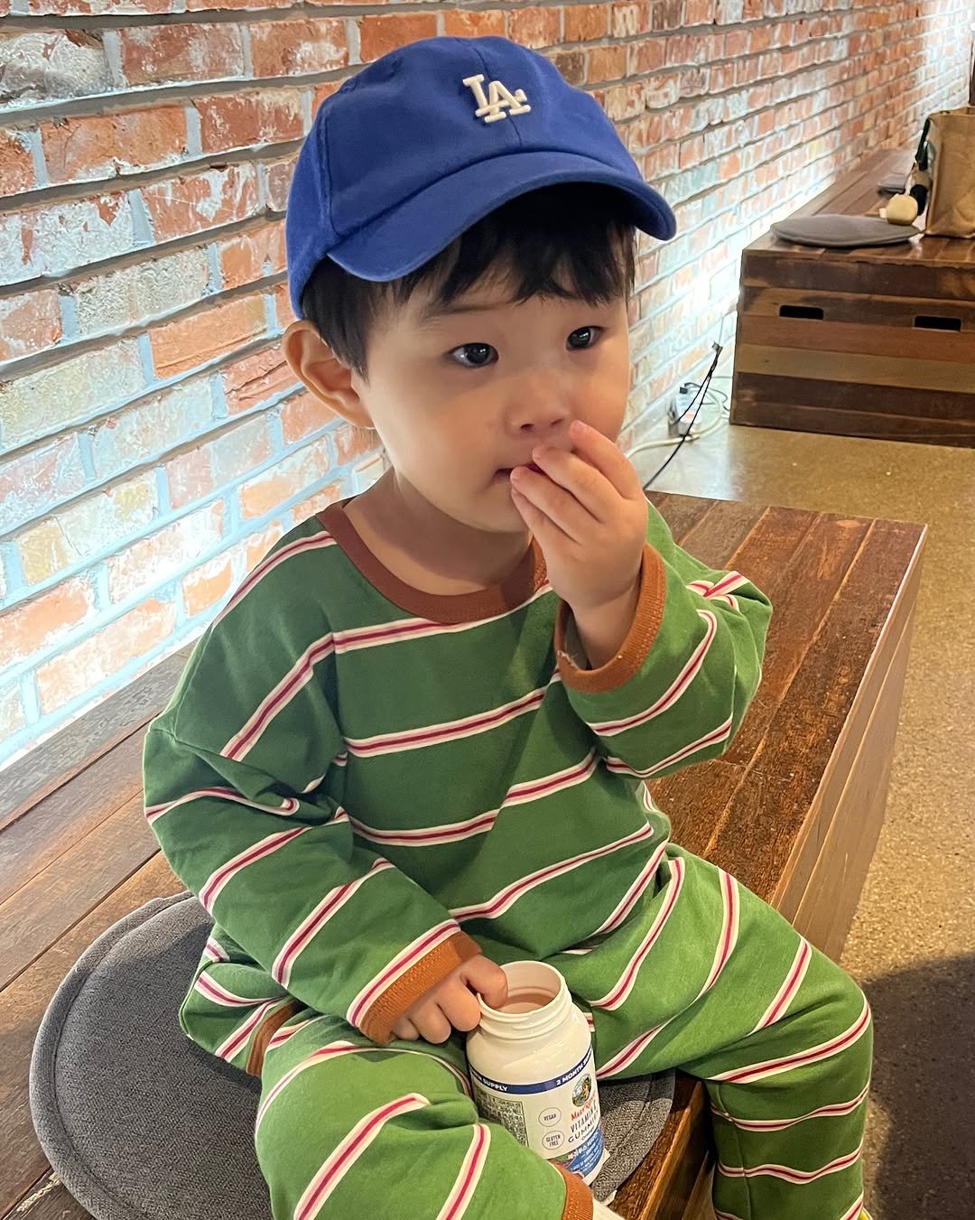 Photo shared by 이츄맘💖 on September 29, 2025 tagging @maryruth_korea. May be an image of 1 person, baby, hat, cornflower and text.