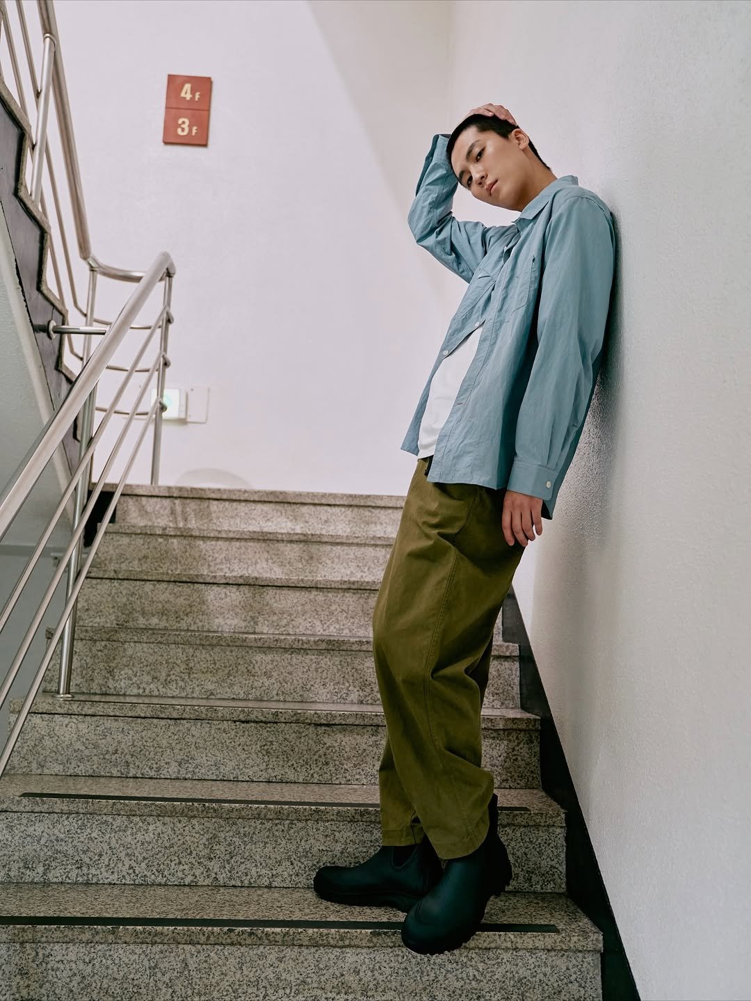 Photo by 김정철 on November 21, 2025. May be an image of duffle coat, parka, sweatpants and text.