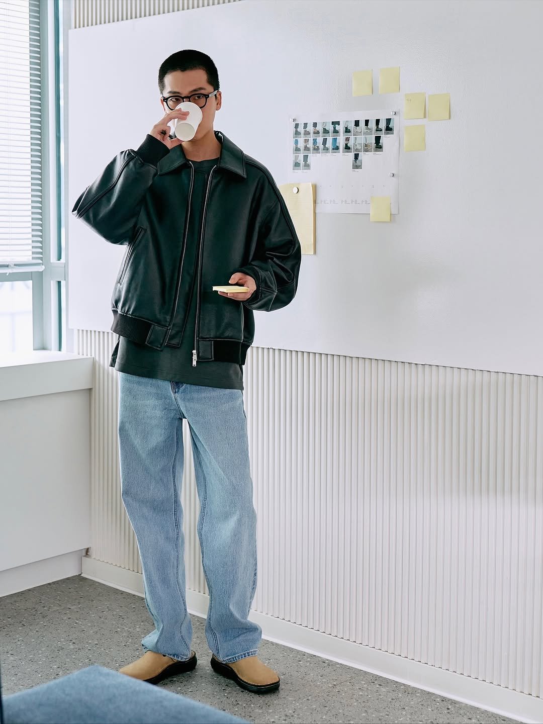 Photo by 김정철 on October 17, 2025. May be an image of wingtip shoes, sweatpants and flight jacket.