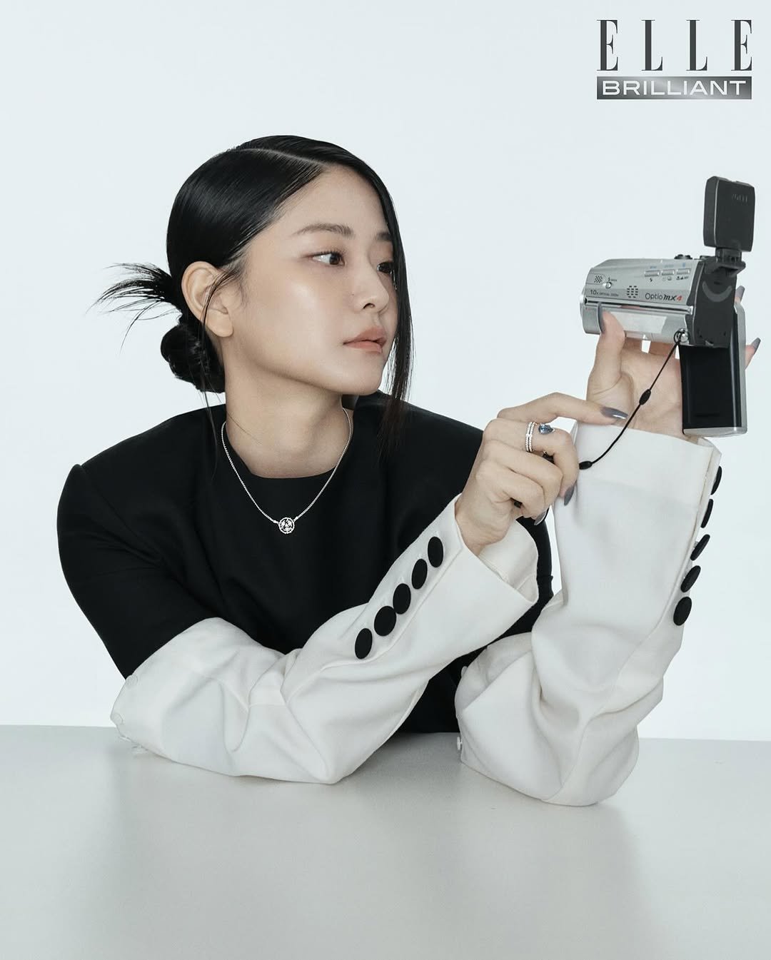 Photo shared by 정수빈 on October 13, 2025 tagging @repossi, @ellekorea, @hanacha_studio, and @buccellatimilan. May be an image of one or more people, hair, makeup, top, magazine and text.