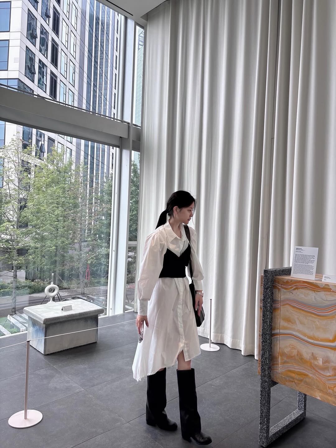 Photo by 정수빈 on October 03, 2025. May be an image of 1 person, overcoat and text.