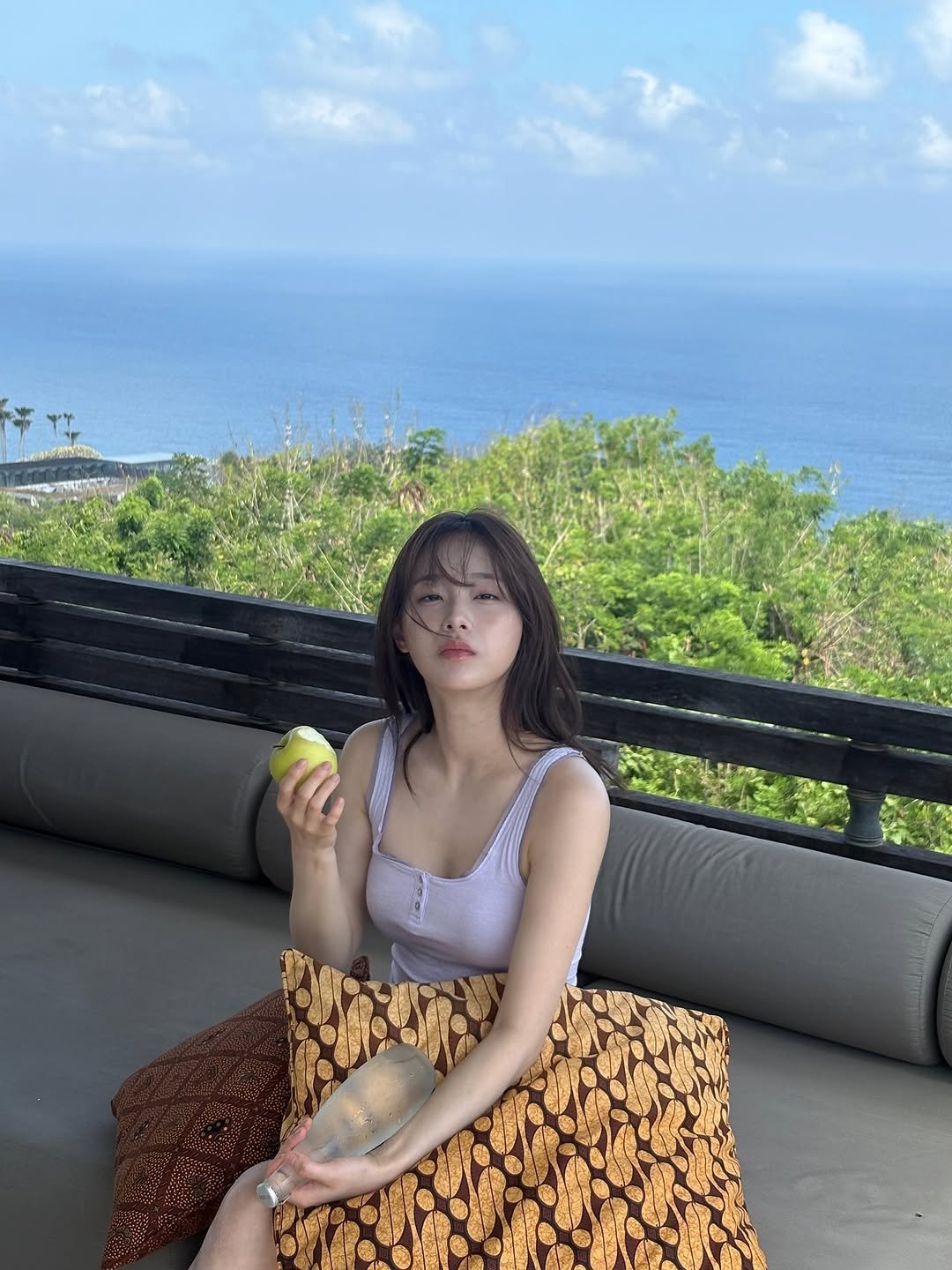 Photo by 츄 on October 17, 2025. May be an image of sarong, sundress, outdoors and text.