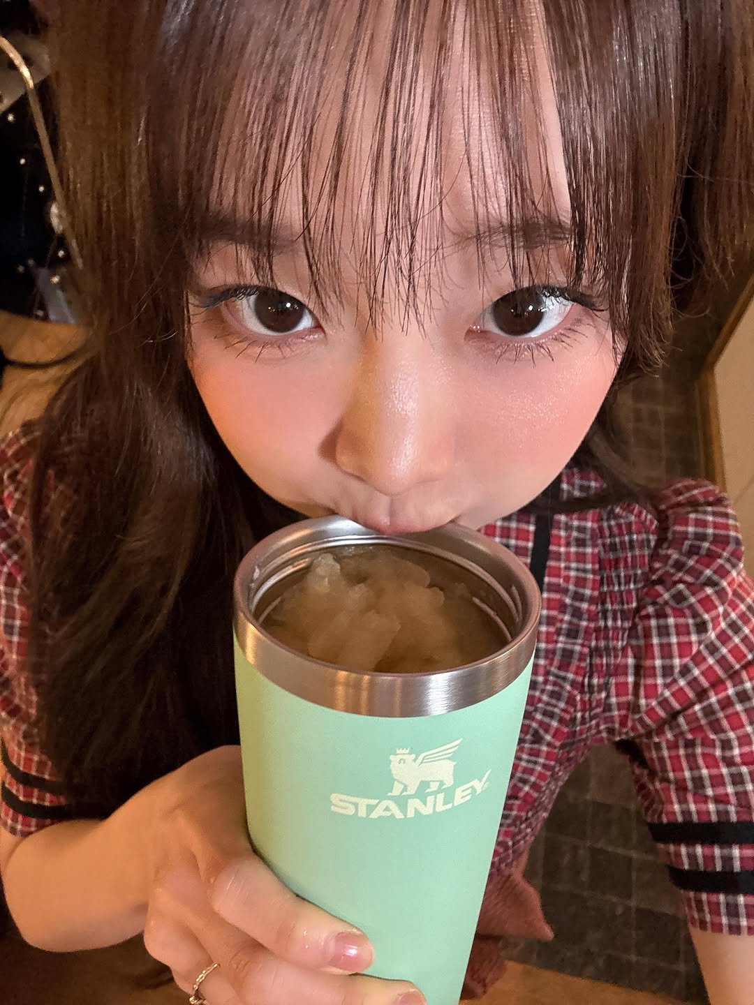 Photo shared by 츄 on November 26, 2025 tagging @stanley_korea. May be an image of cup, cornflower and text that says 'STANLE PALEY'.