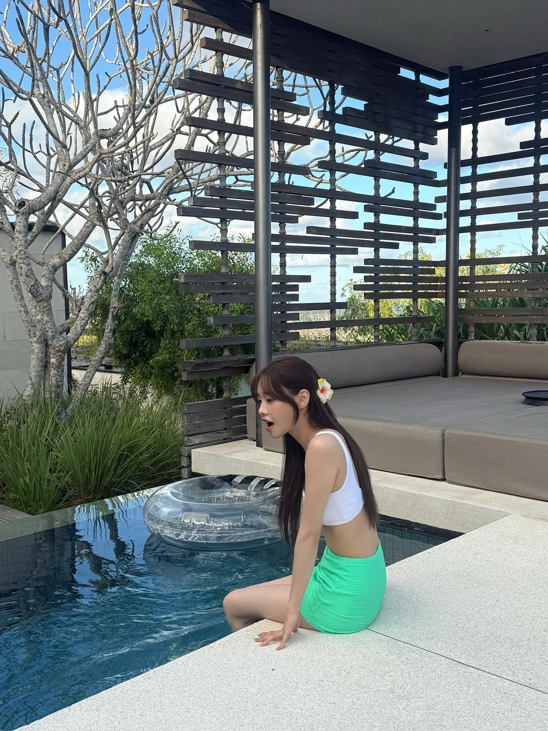 Photo by 츄 on September 24, 2025. May be an image of sarong, pool, outdoors and text.