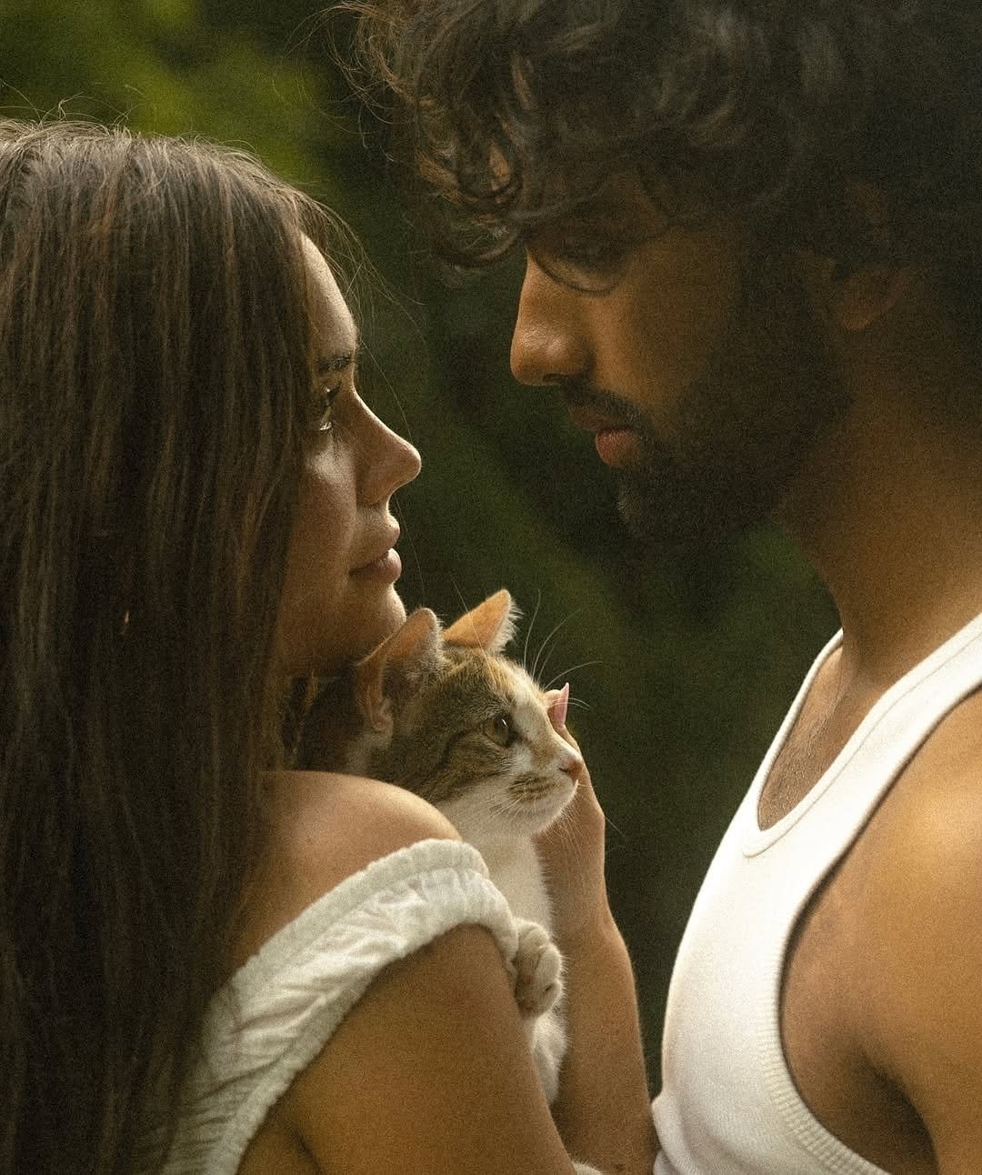 Photo shared by CINEGRAMS on February 14, 2026 tagging @esthercanon. May be an image of one or more people, beard, makeup, people kissing, kitten and text.