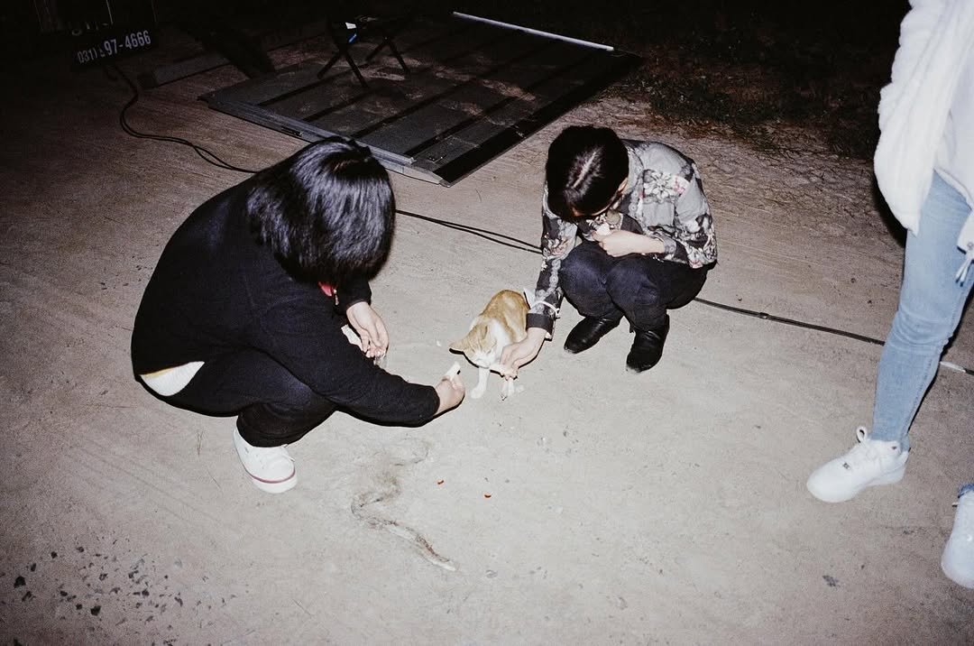 Photo shared by 워킹아하 WALKING AHA on December 11, 2025 tagging @cinematograph____. May be an image of baby, sparkler and text.