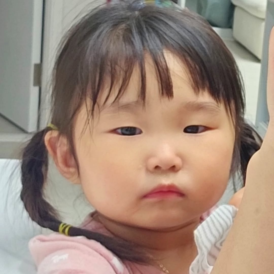 Photo by 혜진 on September 18, 2025. May be an image of 1 person, baby, hair, bandage and text.