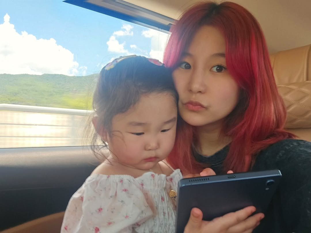 Photo by 혜진 on August 02, 2025. May be an image of 2 people, baby, hair, bus and text.