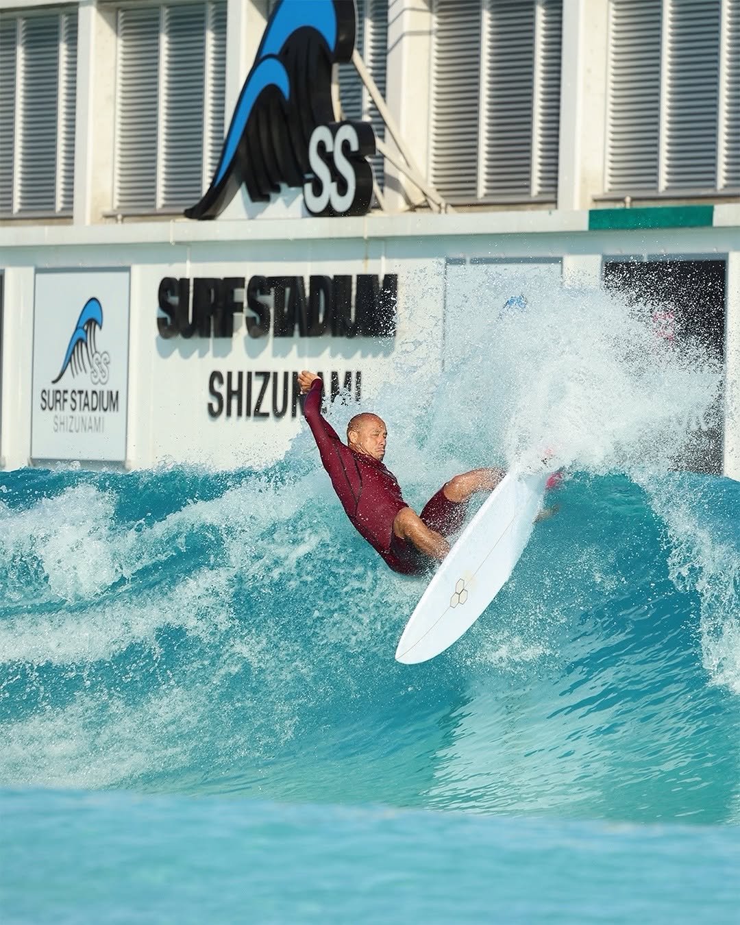 Photo shared by Channel Islands Surfboards on February 13, 2026 tagging @masatoshiohno, and @cisurfboards_japan. May be an image of surfboard, wetsuit, water and text that says 'SS A SURFSTDUM SURFSTADIUM SURF SHIZUNAMI SHIZUKINI SHIZUK'.