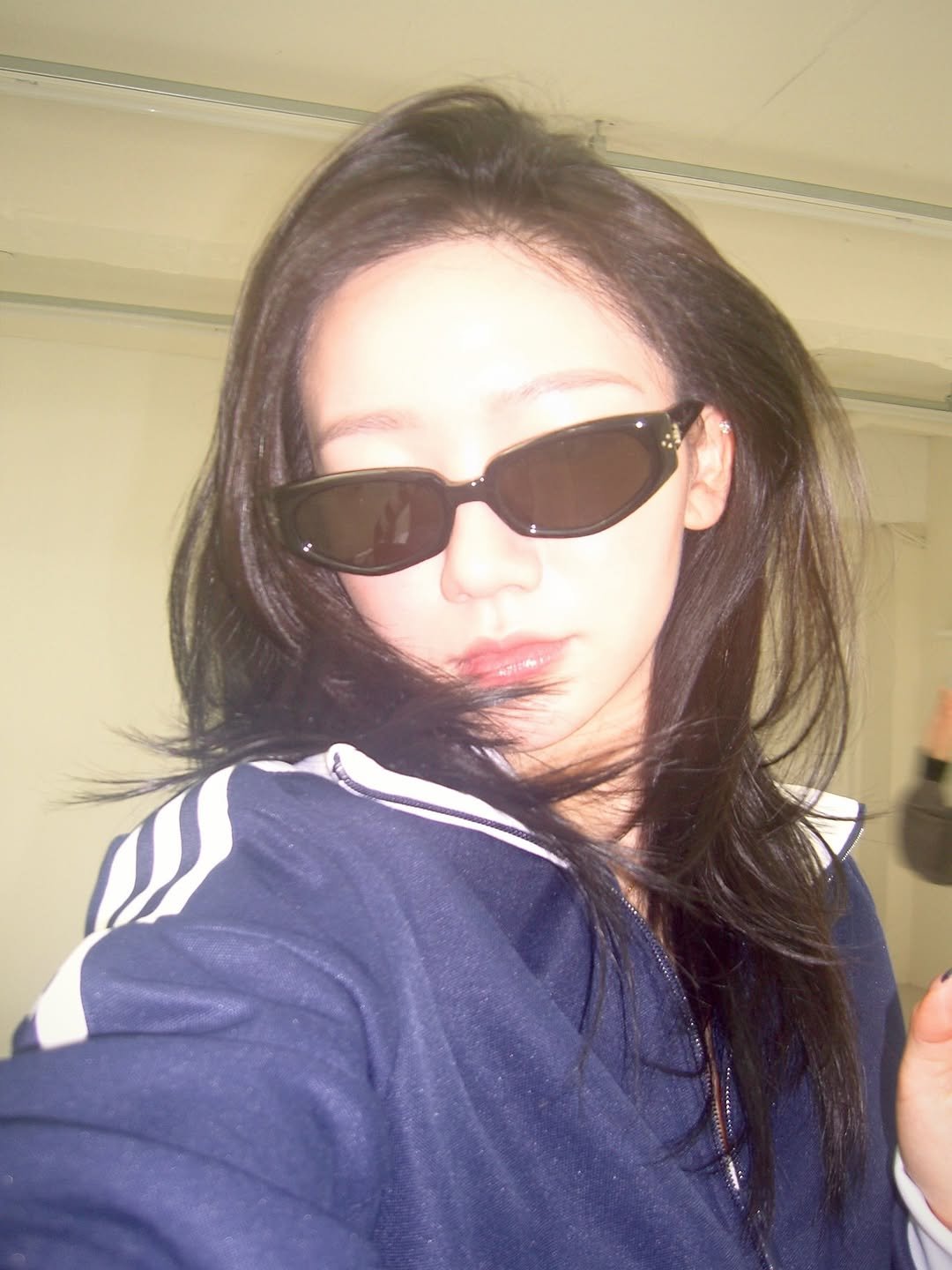 Photo by 예린 on February 12, 2026. May be an image of one or more people, hair, sunglasses and text.