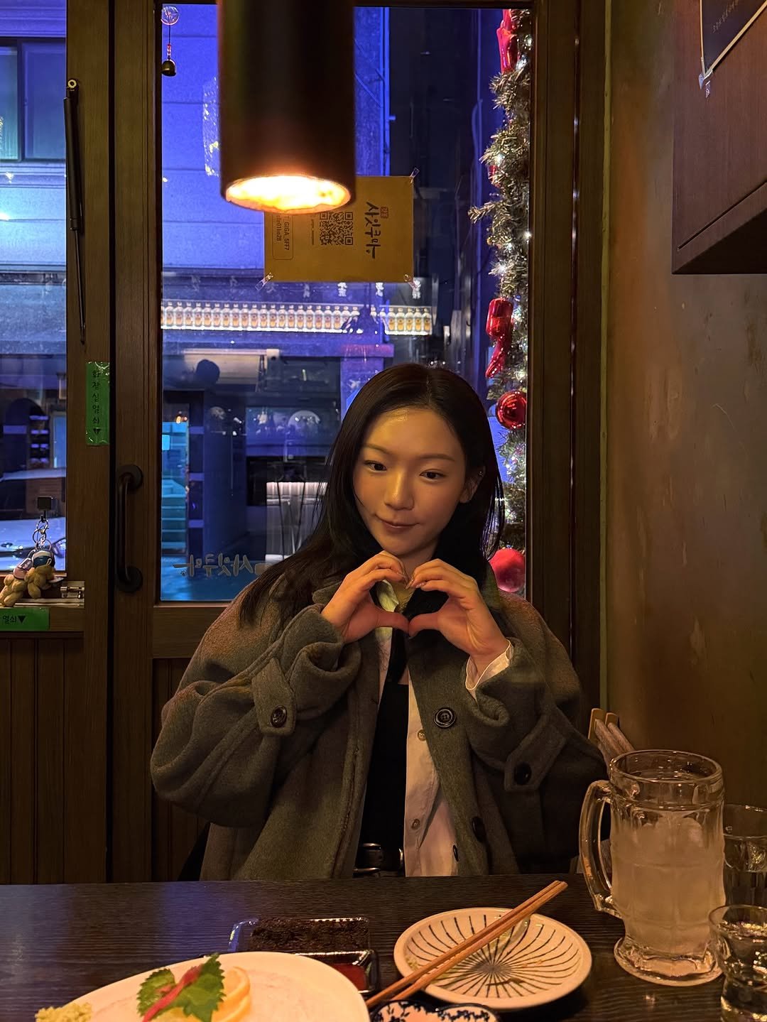 Photo by 예린 on December 30, 2025. May be an image of chopsticks, turtleneck and text.