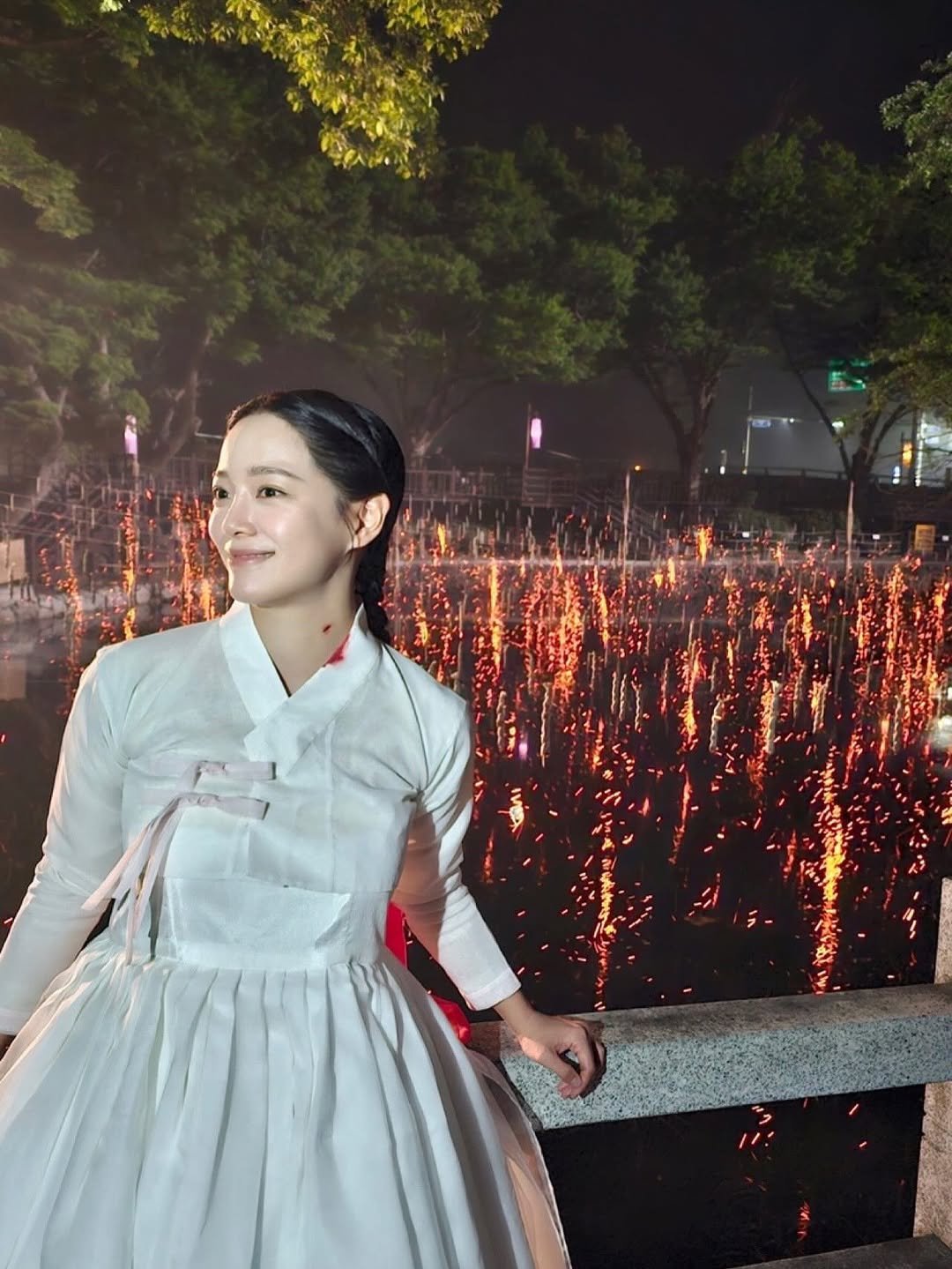 Photo by 김세정 on November 14, 2025. May be an image of one or more people, dress and text.