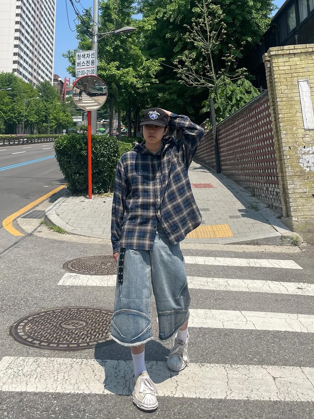 Photo shared by Ol정인 on May 29, 2025 tagging @dnsr__official. May be an image of duffle coat, flannel and street.