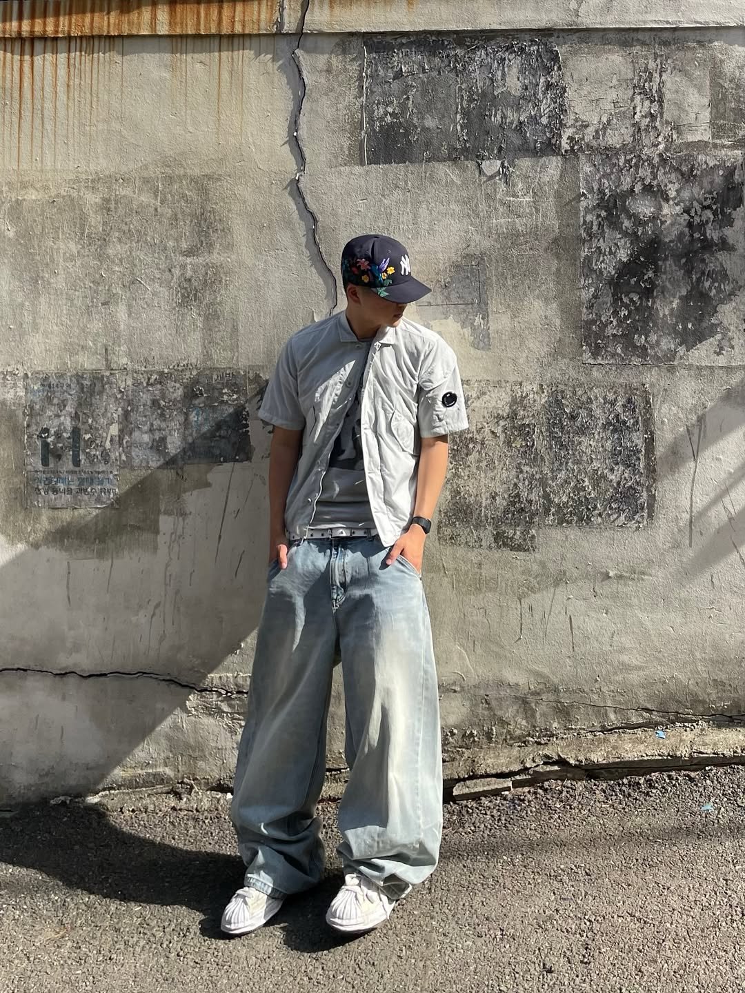 Photo shared by 정인 on April 18, 2026 tagging @dnsr__official. May be an image of hat, sweatpants and text.