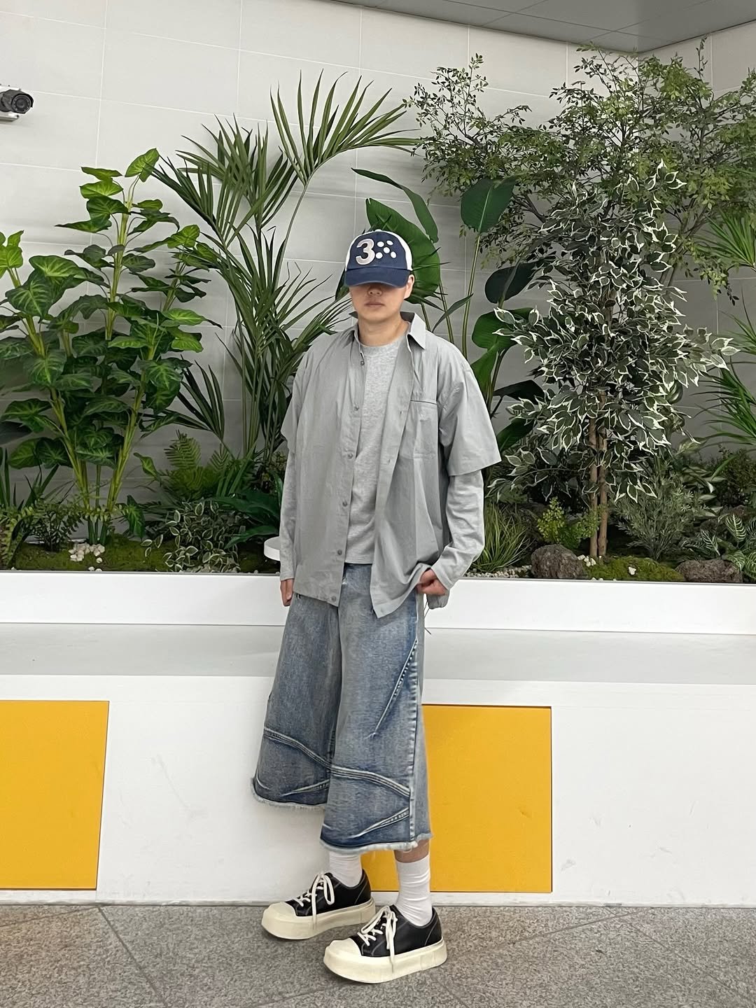 Photo shared by 정인 on April 22, 2026 tagging @placeman.kr. May be an image of hat, sweatpants and text.