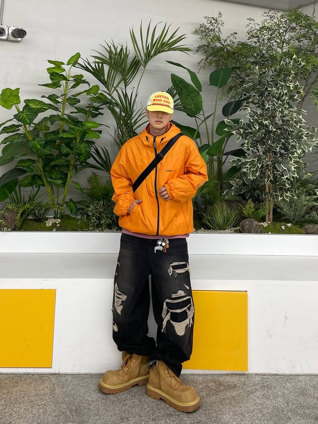 Photo shared by 정인 on February 17, 2026 tagging @beipril_official. May be an image of raincoat, parka and text.