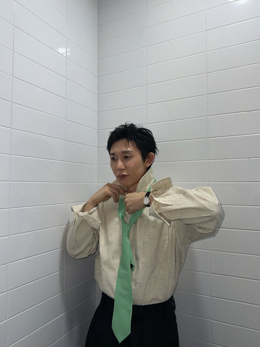 Photo by CODE KUNST on August 19, 2025. May be an image of 1 person, bolo tie, clothes hanger and text.