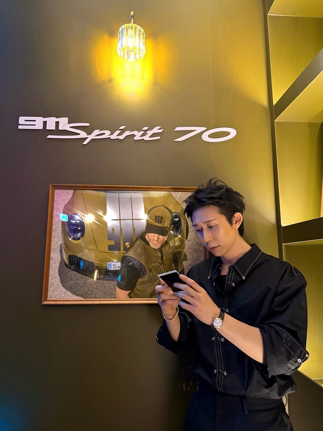 Photo shared by CODE KUNST on August 28, 2025 tagging @porsche, and @porsche.korea. May be an image of phone, bolo tie, top and text that says 'EnSpirit 70 S. 5'.