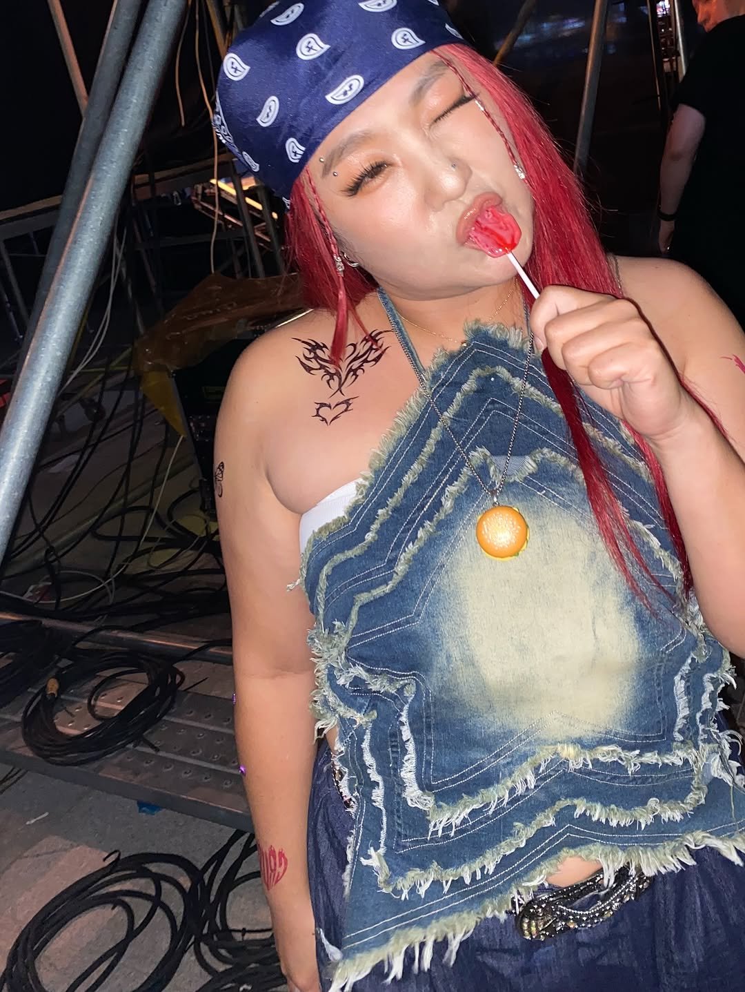 Photo by 이수지 on August 31, 2025. May be an image of bandanna, headscarf and lollipop.