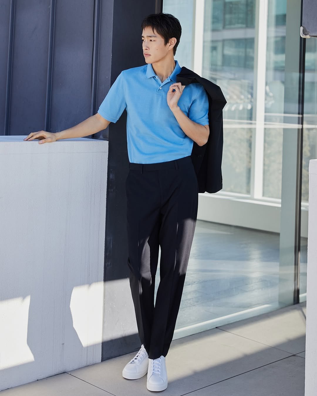 Photo by 컨셉원 concepts1one on August 12, 2025. May be an image of 1 person, wingtip shoes, activewear, sweatpants, sportswear and text.