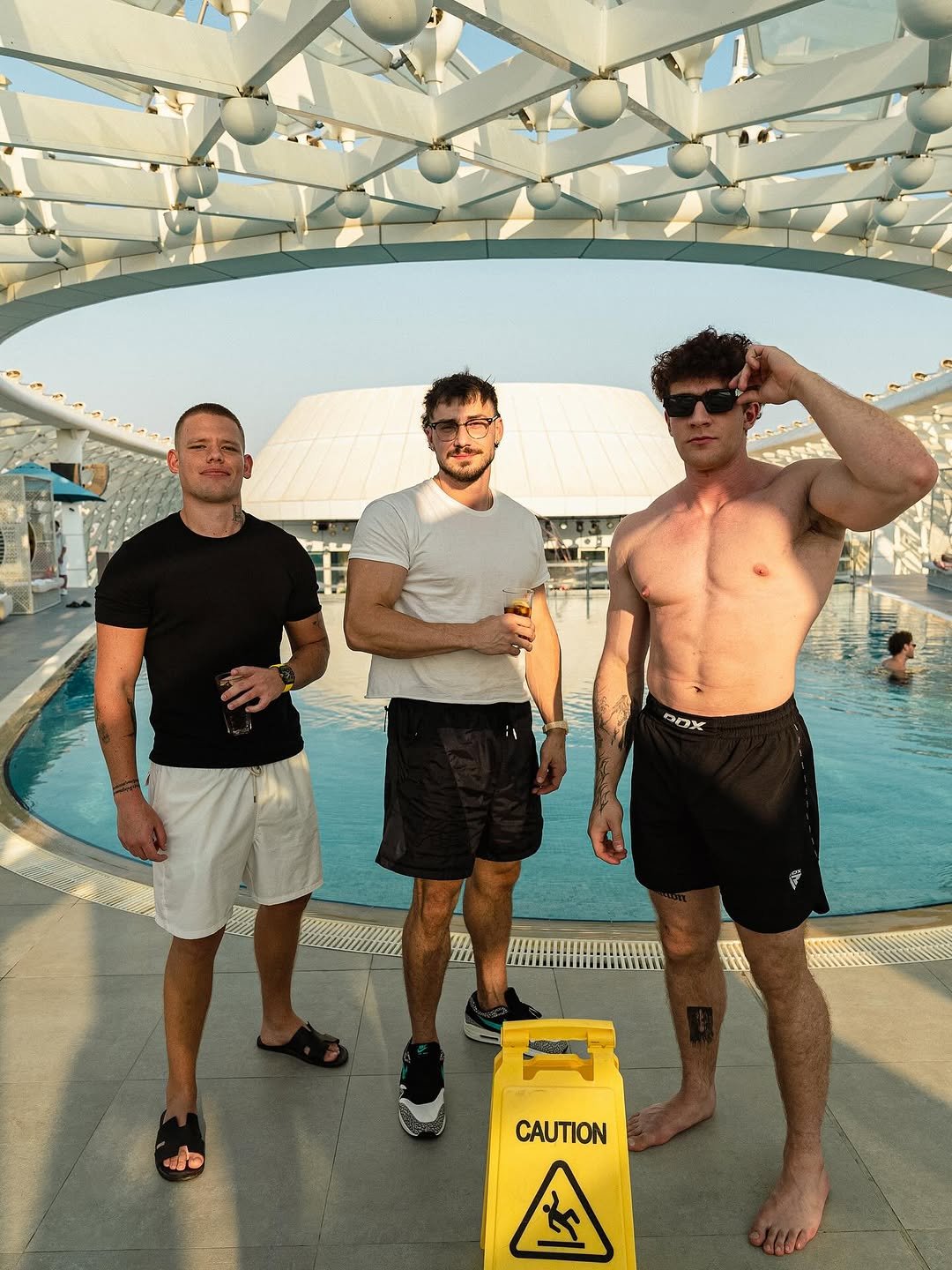 Photo shared by Connor Sinann 🦇 on October 27, 2025 tagging @josh.briant, and @marco.spasiano. May be an image of ‎one or more people, biceps, people bodybuilding, people standing, pool and ‎text that says '‎م in BOX 蓝 CAUTION 全 م‎'‎‎.