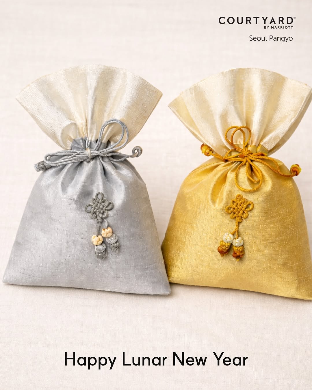 Photo by 코트야드 바이 메리어트 서울 판교 in Courtyard by Marriott Seoul Pangyo. May be an image of napkin ring, drawstring, hamper and text that says 'COURTYARD® BYMARRIOTT Seoul SeoulPangyo Pangyo Happy Lunar New Year'.