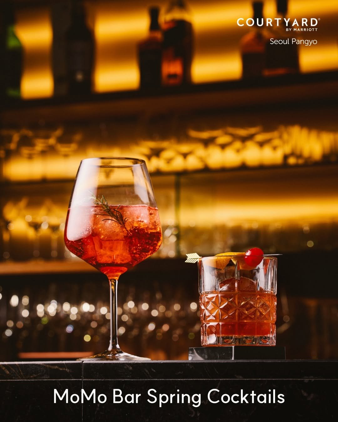 Photo shared by 코트야드 바이 메리어트 서울 판교 on February 27, 2026 tagging @courtyardpangyo. May be an image of cocktail and text that says 'COURTYARD BYMARRIOTT SeoulPangyo Seoul Pangyo MoMo Bar Spring Cocktails'.