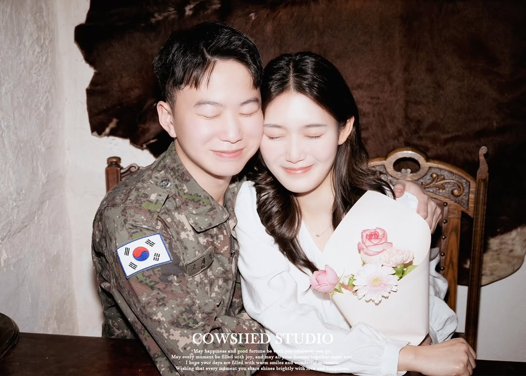 Photo by 외양간 스튜디오 | 홍대사진관 · 커플사진 · 커플스냅· 프로필사진 · 홍대증명사진 in 외양간스튜디오. May be an image of one or more people, military uniform and text.