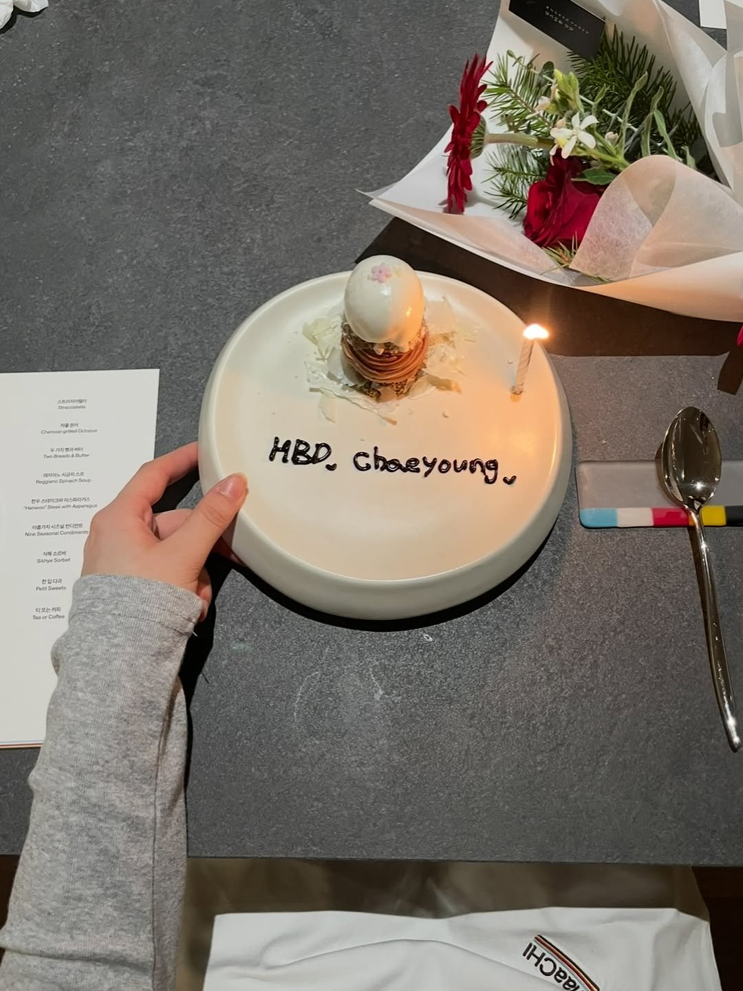 Photo shared by 채영 on December 25, 2025 tagging @maachi_steakhouse. May be an image of dessert, candle and text.
