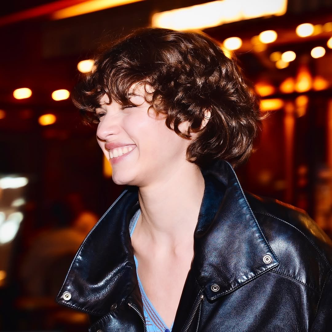 Photo shared by 창영 | changyoung on September 28, 2025 tagging @mathilda.gvarliani. May be an image of one or more people, hair, makeup, leather and text.