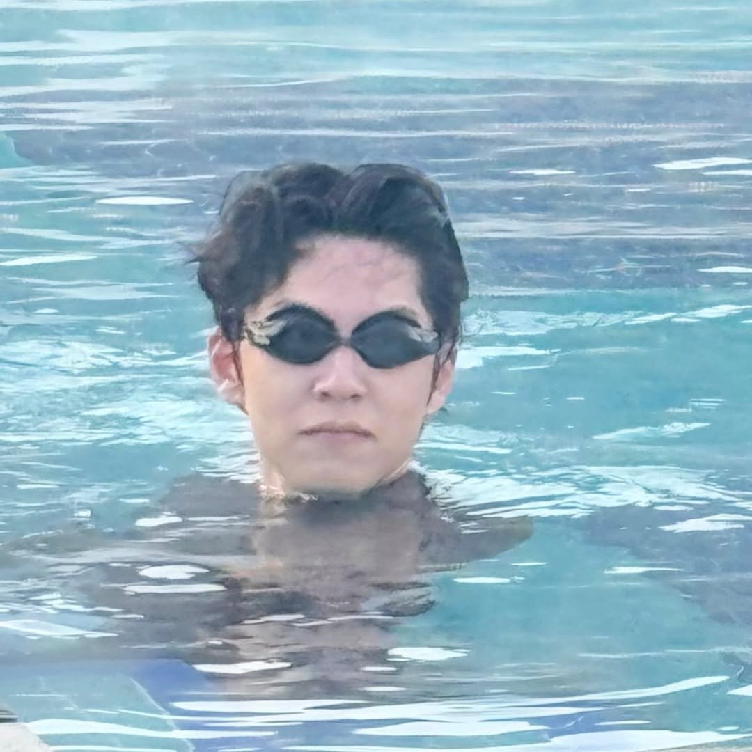 Photo by DAY6_drummer on March 30, 2026. May be an image of swimming, glasses, wetsuit, pool and text.