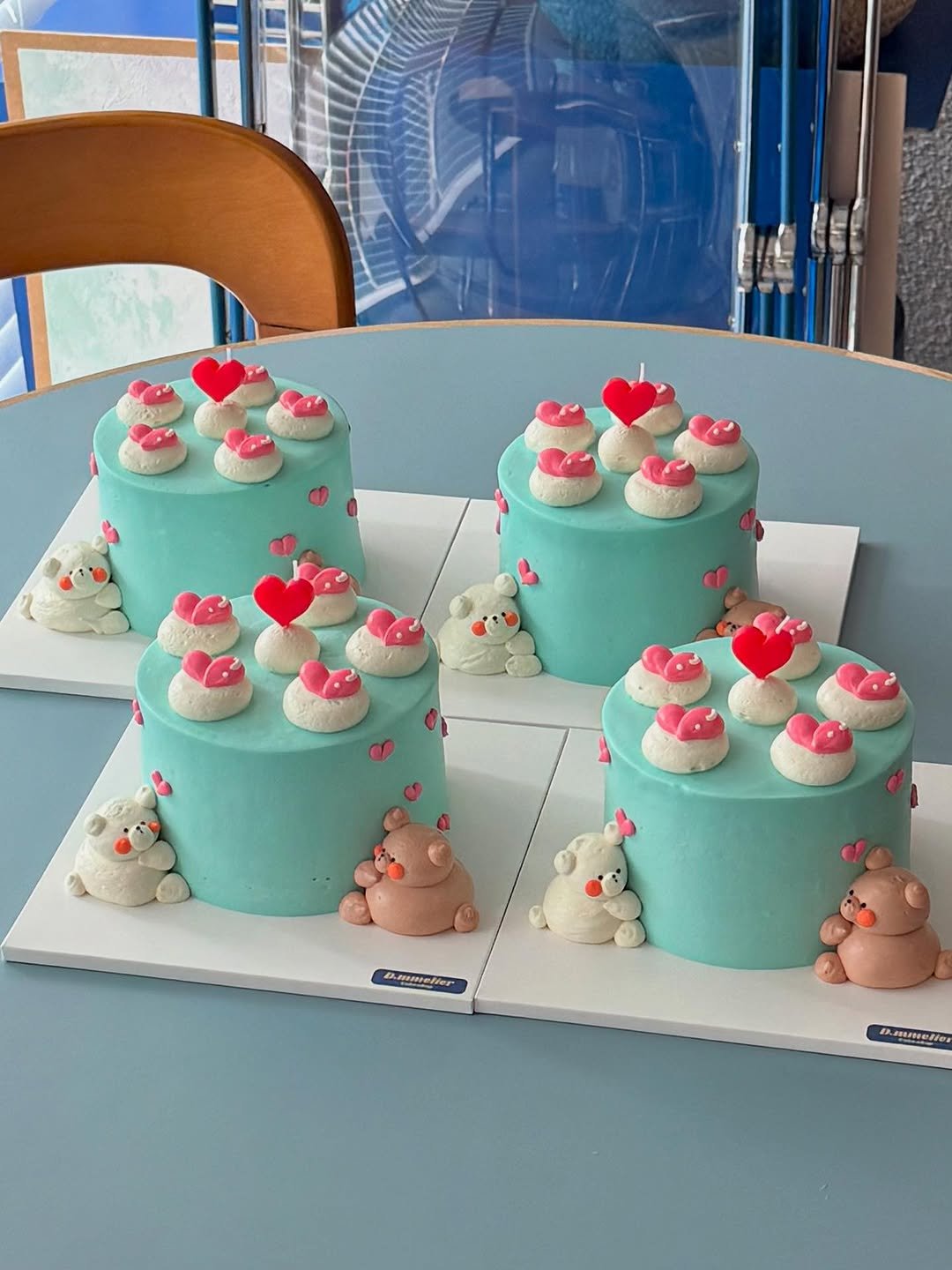 Photo by 수원 행궁동 케이크 디믈리에 on August 02, 2025. May be an image of wedding cake, cupcake and text.