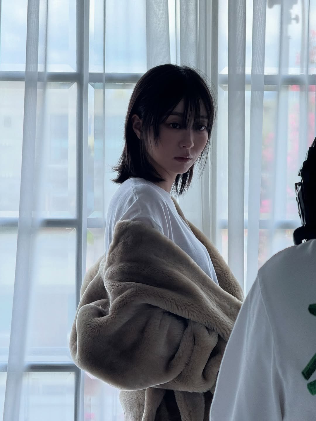 Photo by KIM DA MI on September 02, 2025. May be an image of 2 people, hair, makeup, duffle coat, top, bath robe and text.