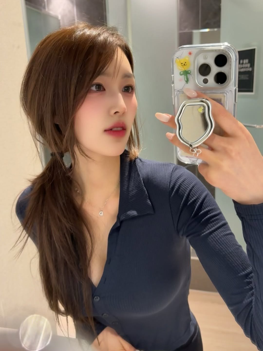 Photo by 윤이나 on January 07, 2026. May be a selfie of one or more people, hair, phone, top and mirror.