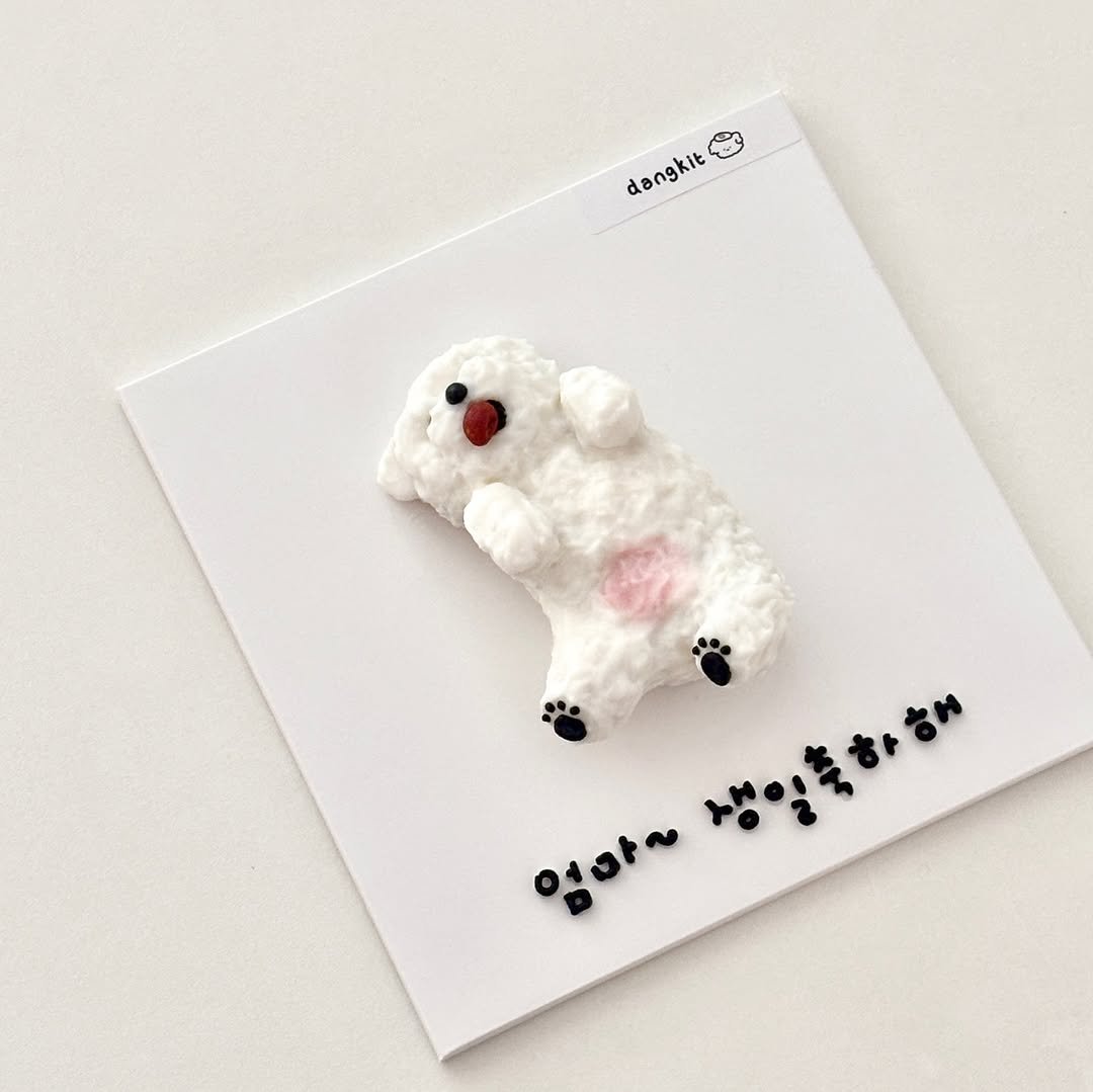 Photo by 부산강아지케이크 강아지케이크클래스 펫푸드창업  | 댕킷 on February 14, 2026. May be an image of pencil case, barrette, eraser and text that says 'dangkit 엄마~ 생일축하해'.