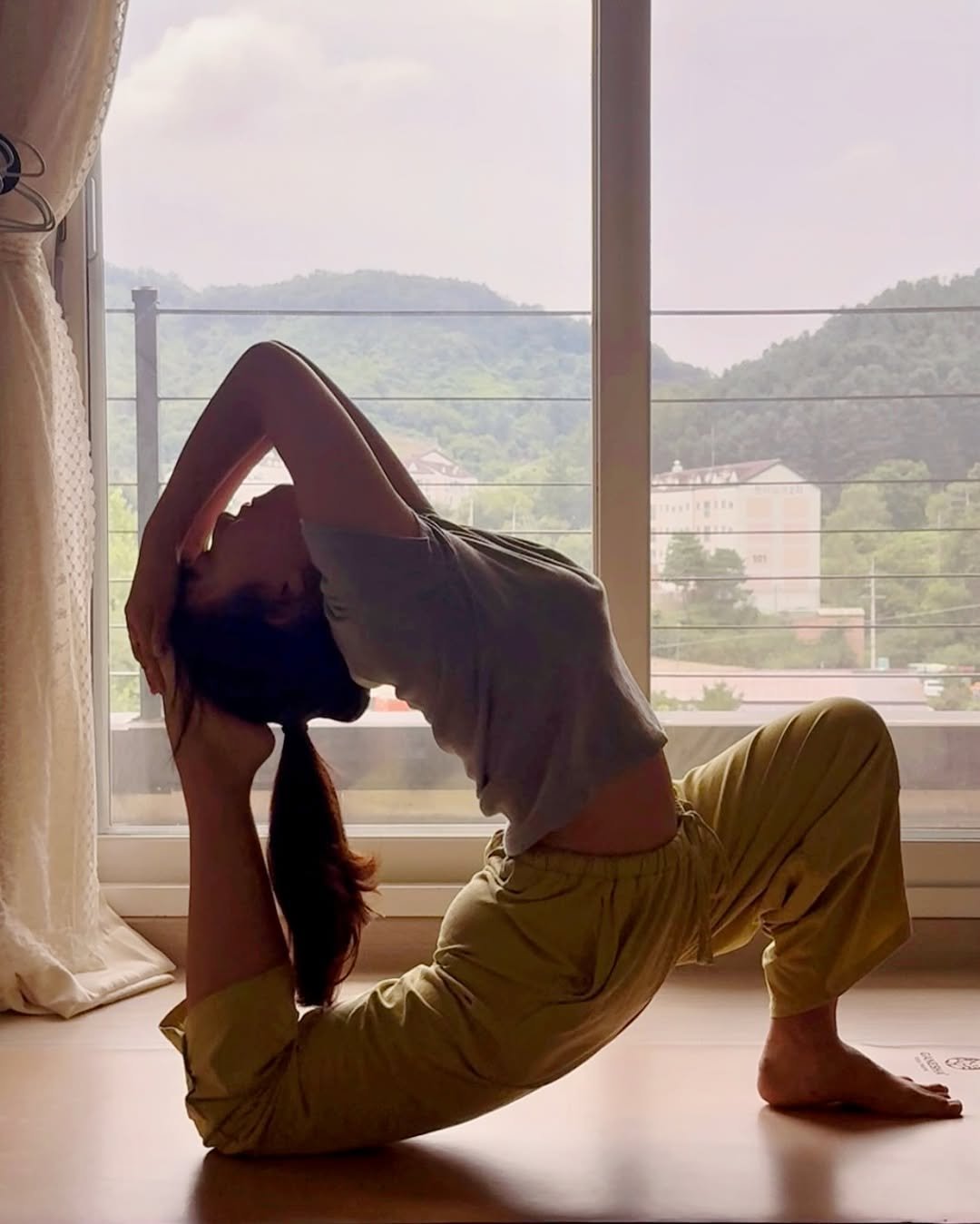 Photo shared by 송 단 | 요가, 라이프스타일 on September 08, 2025 tagging @daniiisong. May be an image of 1 person, practicing yoga, activewear and text.