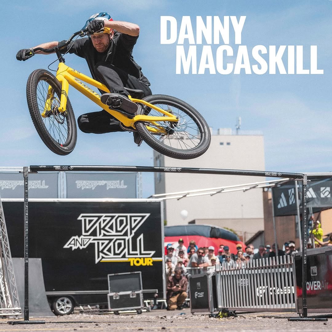 Photo shared by DROP AND ROLL TOUR on June 22, 2025 tagging @duncshaw, @mucoff, @adidasfiveten, @wibmergabriel, @danny_macaskill, @hoverair_global, @eurobike_show, and @cast_official_. May be an image of 2 people, bicycle and text.