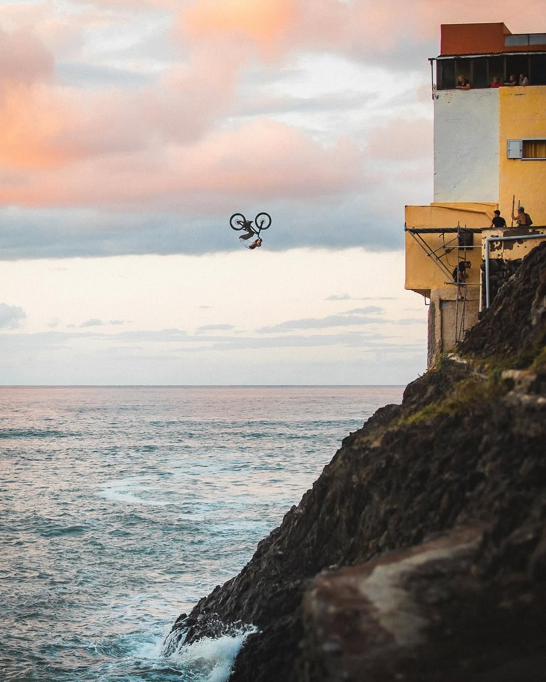 Photo shared by Dave Mackison on October 21, 2025 tagging @danny_macaskill, and @wearepeny. May be an image of skydiving, helicopter, kite, parachute and text.