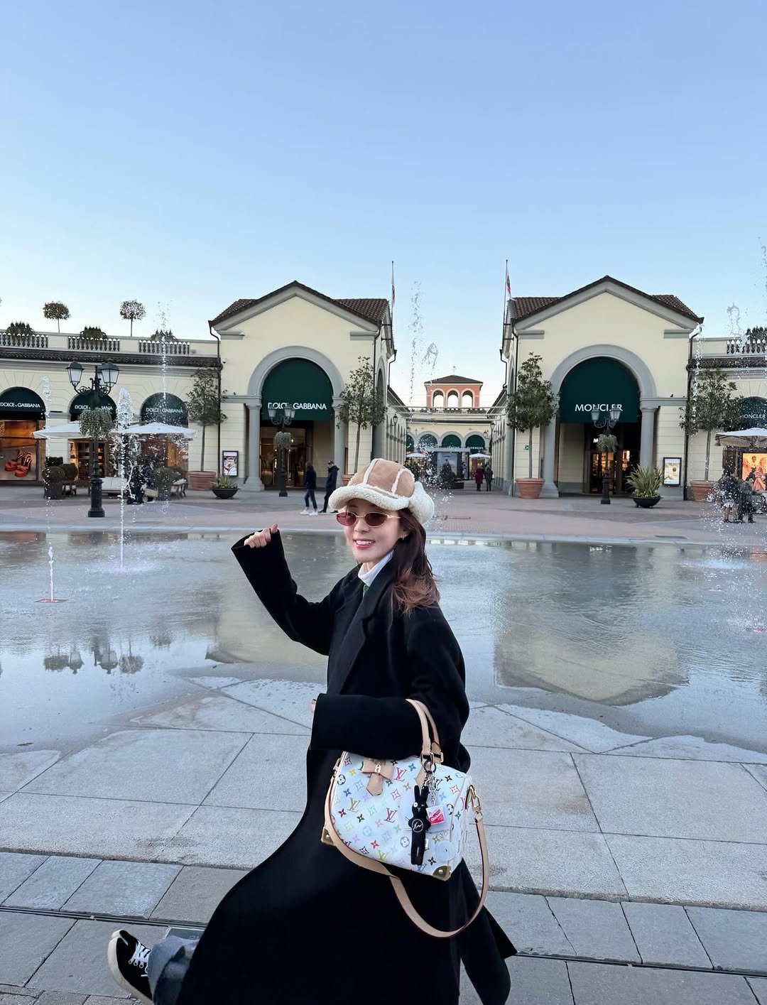 Photo by Sandara Park on February 22, 2026. May be an image of umbrella, fountain and text.