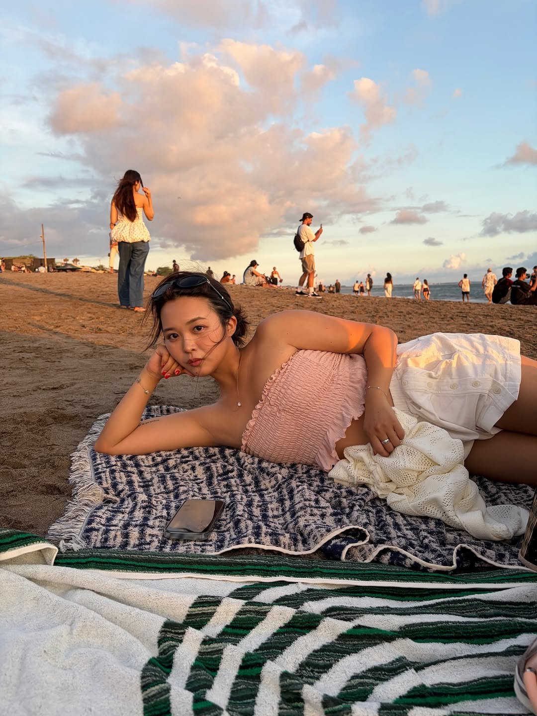 Photo by 김 다혜 / Dahye kim on April 01, 2026. May be an image of one or more people, sarong, sundress, beach and text.